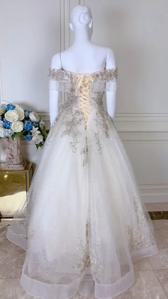 THE BRIDES GOWN